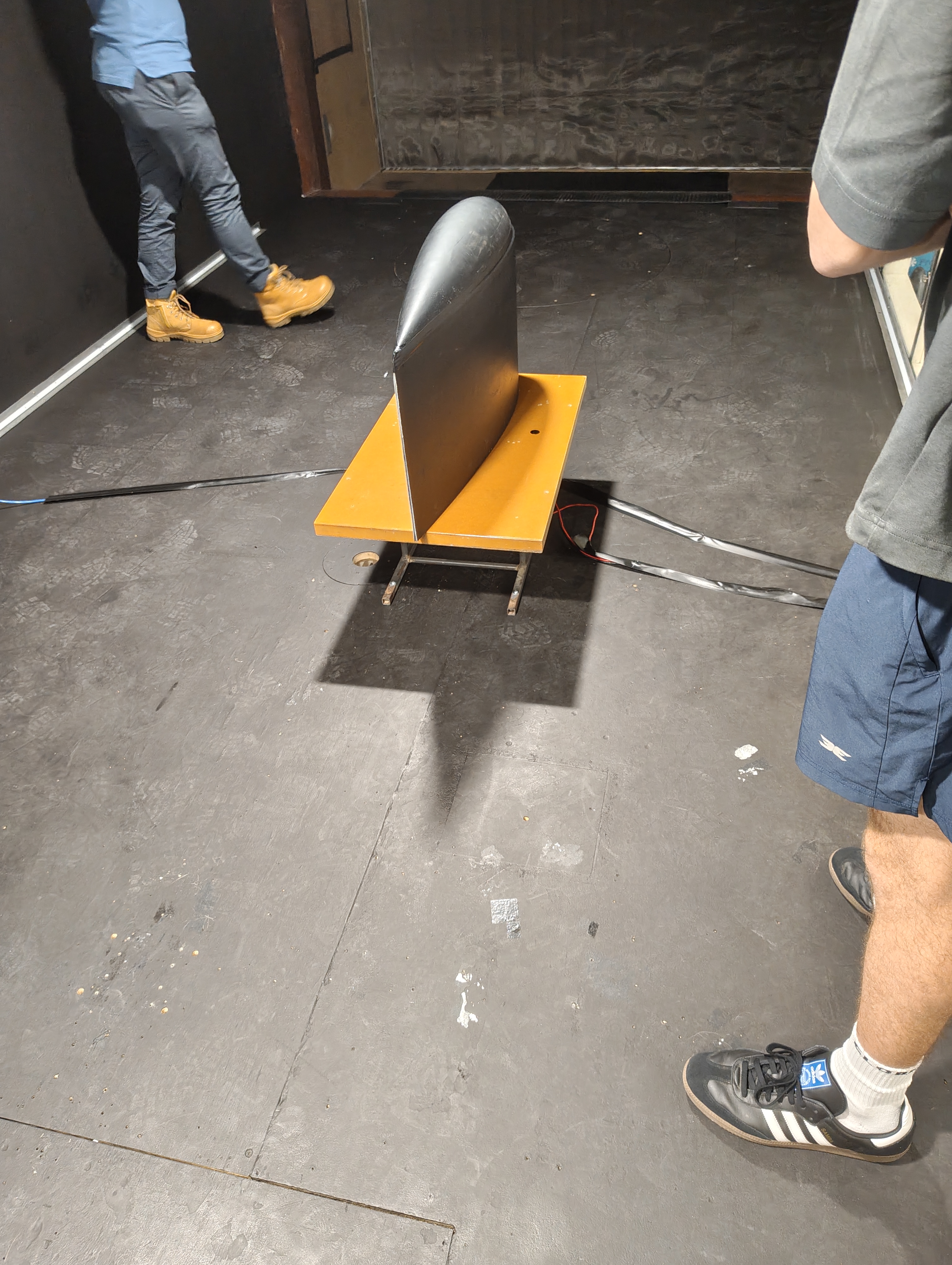 Wing model mounted in the wind tunnel test section