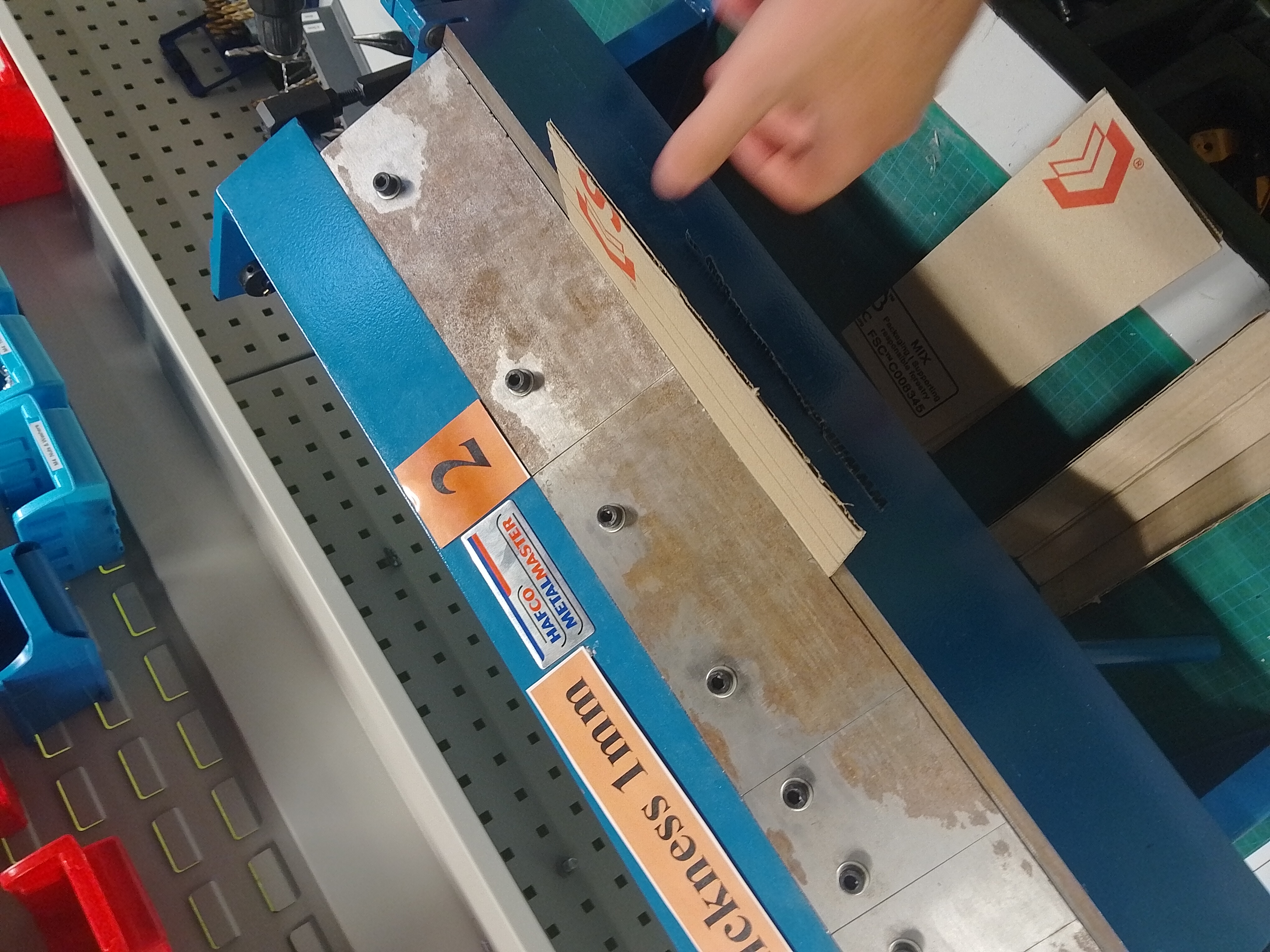 Folding stiffener sections on a sheet-metal brake